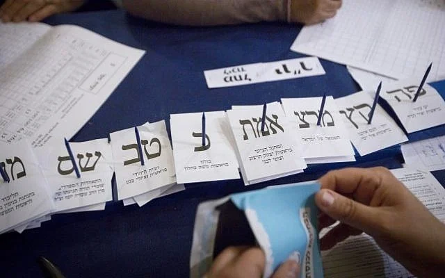 Voting slips being counted in Israeli election for the Knesset. (Courtesy Times of Israel, Miriam Alster/Flash90).