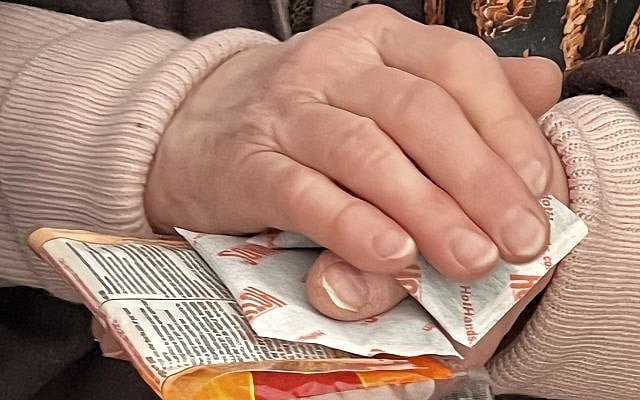 A hand warmer shared with an older adult during a World Jewish Relief home visit in Kyiv. Sometimes love is as simple as helping someone stay warm.