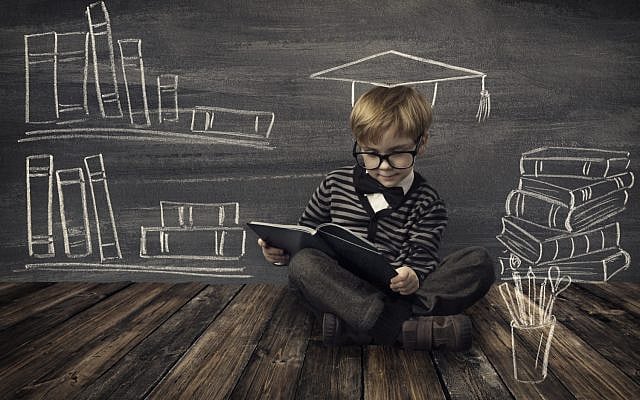 Child Little Boy in Glasses Reading Book over School Black Board with Chalk Drawing, Kids Preschool Development, Children Education Concept