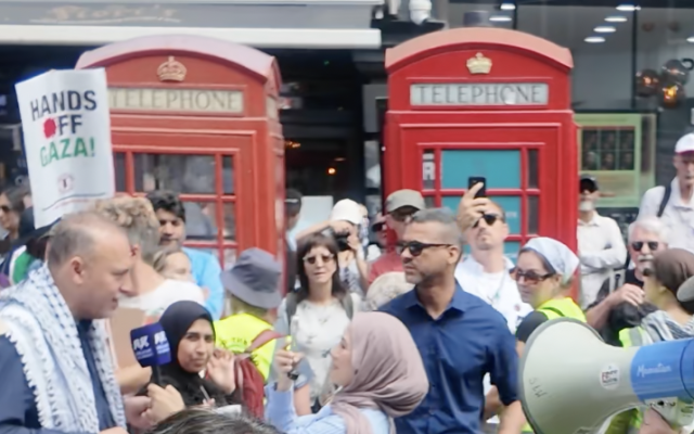 Husam Zomlot being interviewed at the from of the procession before it sets off. 18/07/2026 by author.