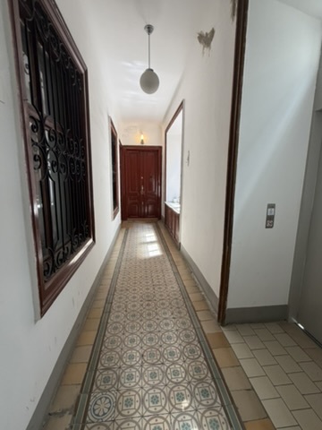 The entrance hall, Marchettigasse. (Julian Ungar-Sargon, July 2026)