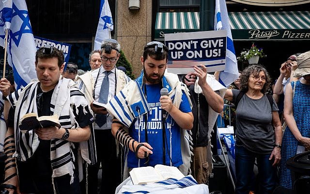 Jews held a Tisha B'av protest opposing Israeli government moves they said curbed democracy outside the Israeli consulate in Manhattan, July 26, 2023. (Luke Tress)