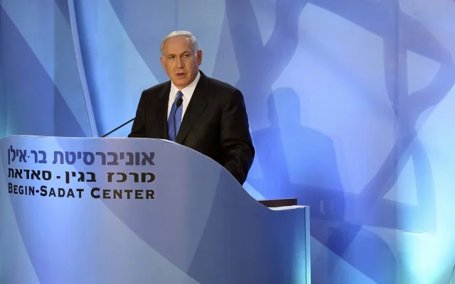 Prime Minister Benjamin Netanyahu delivers a speech at Bar-Ilan University in Ramat Gan near Tel Aviv, June 14, 2009, backing a demilitarized Palestinian state. (AP Photo/Baz Ratner,Pool)