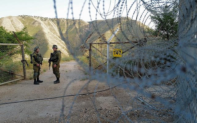 Israeli soldiers patrol in the tripoint border between Israel, Syria, and Jordan, northern Israel, on May 12, 2022. (Michael Giladi/Flash 90)
