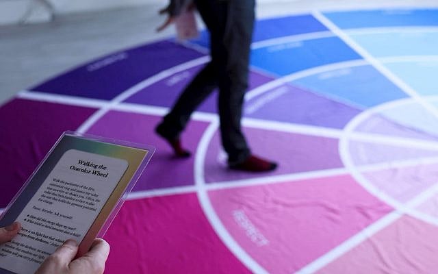 Walking the 20-foot Oracolor Wheel. Credit: Andrea Lonas Photography