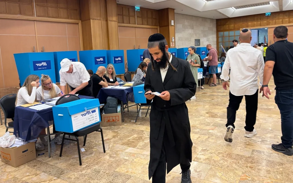 Likud members vote in the party's primary in Jerusalem, August 17, 2026. (Sam Sokol/The Times of Israel)