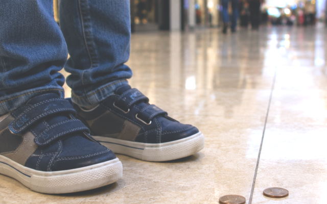 Caption: Pennies beside my feet. 
Credit: AI Generated, edited by James Finney-Conlon