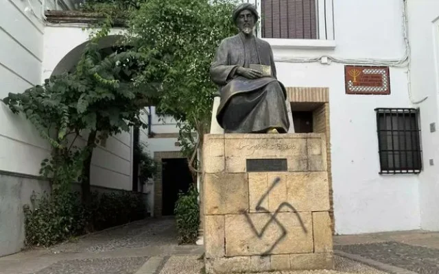 Swastika graffiti on a statue of Maimonides in Cordoba, Spain, discovered on August 1, 2026. (European Jewish Congress on X)