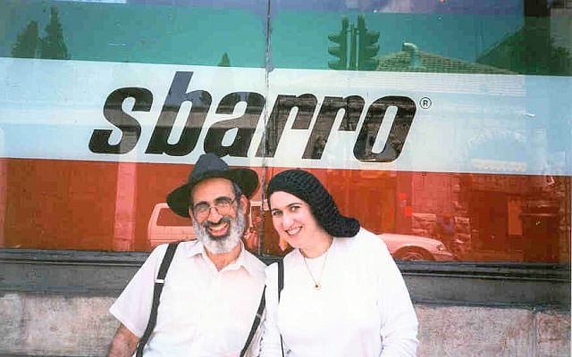Shmuel and Shoshana Greenbaum stand in front of the now infamous pizzeria in 2001, days before the bombing at Sbarro took her life. (Courtesy, Shmuel Greenbaum)