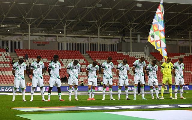 Ireland's soccer players bow their heads as the Israeli national anthem plays before their UEFA Nations League match in Debrecen, Hungary, September 27, 2026. (Bernadett Szabo/Reuters)