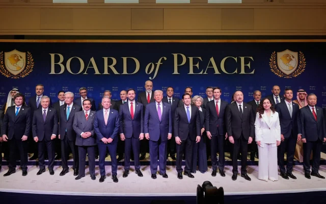 President Donald Trump stands with other world leaders before a Board of Peace meeting at the US Institute of Peace, February 19, 2026, in Washington. (AP Photo/Mark Schiefelbein) President Donald Trump stands with other world leaders before a Board of Peace meeting at the US Institute of Peace, February 19, 2026, in Washington. (AP Photo/Mark Schiefelbein)