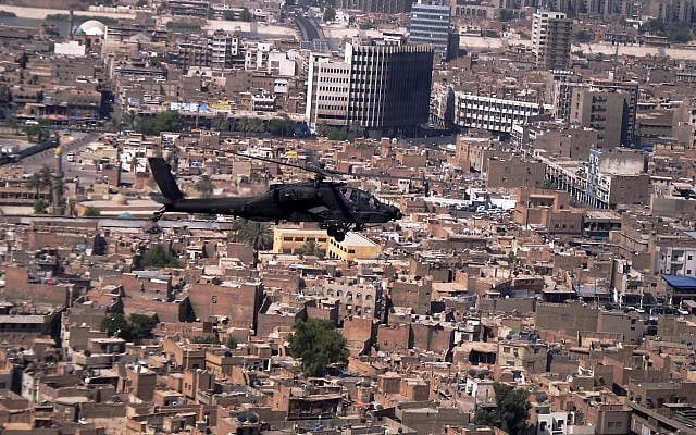Boeing AH-64 Apache flying over Baghdad, Iraq.
Photo by Ahodges7 – "Apache over Baghdad". Marked as public domain, more details on Wikimedia Commons. Boeing AH-64 Apache flying over Baghdad, Iraq.
Photo by Ahodges7 – "Apache over Baghdad". Marked as public domain, more details on Wikimedia Commons.