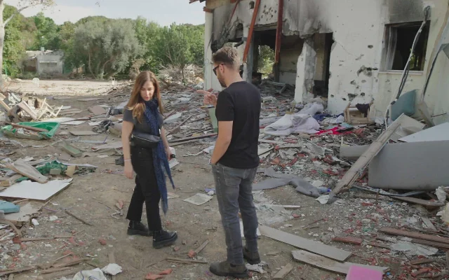 Filmmaker Leslie Gelrubin Benitah sees the devastation wrought on Kibbutz Be'eri during the Hamas assault of October 7, 2023, in this still from 'Milk and Honey, Blood and Tears.' (Courtesy)