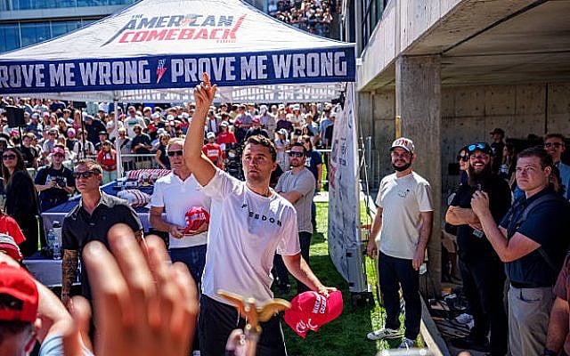 OREM, UTAH - SEPTEMBER 10:  Charlie Kirk throws hats to the crowd after arriving at Utah Valley University on September 10, 2025 in Orem, Utah. Kirk, founder of Turning Point USA, was speaking at his 'American Comeback Tour,' when he was shot in the neck and killed. (Trent Nelson/ The Salt Lake Tribune/ Getty Images)