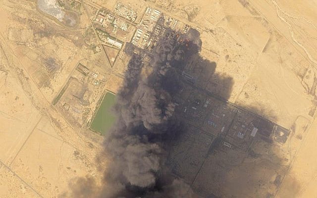 Sudan‘s largest oil refinery set ablaze, sending thick, black smoke over Khartoum, the country’s capital. (AP Photo)