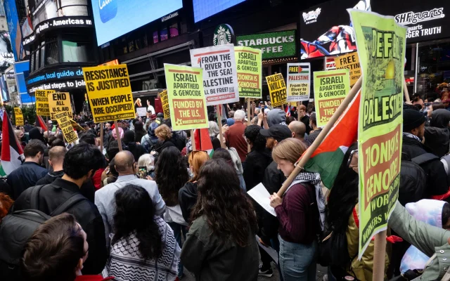 US pro-Palestinian activists during a protest in support of the terror attack against Israel, in New York City, October 8, 2023. (Luke Tress/Times of Israel)