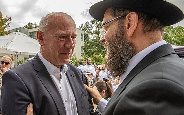 Berlin Governing Mayor Kai Wegner, left, speaks with Rabbi Yehuda Teichtal at an event in Berlin, Germany, before the September 20, 2026 state election. Jewish life and the fight against antisemitism have become central issues in the debate over Berlin’s next government. Picture: Michael Kuenne