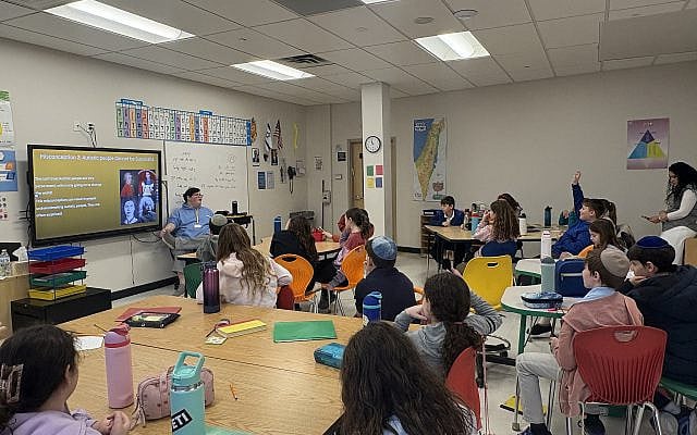 Rafi speaks with a group of students at Temple Emanu-El of Closter, January 2026.