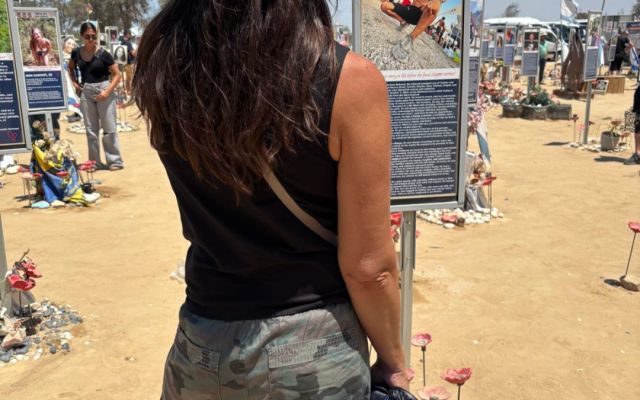 At the Nova memorial site, reading the story of someone I never knew, but whose absence had somehow become personal. (Photo courtesy of Levinsky)