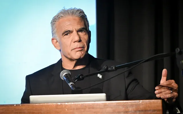 Opposition Leader and Beyachad party member Yair Lapid speaks at the 'Law and Lies' conference, on October 12, 2026, in Israel. (Avshalom Sassoni/ FLASH90)