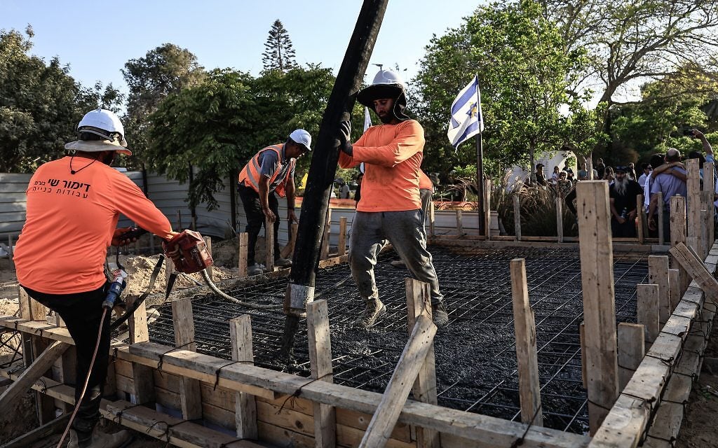 Rebuilding Kibbutz Nir Oz, in southern Israel, two years after the October 7th massacre, on August 7, 2025. (Tsafrir Abayov/ FLASH90)