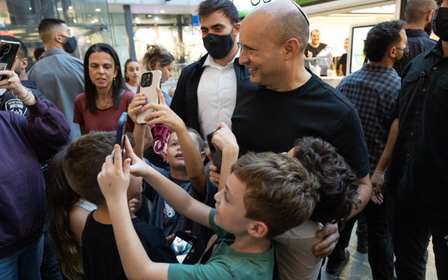 Naftali Bennett campaigns before the October 2026 election (Courtesy)