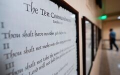 A copy of the Ten Commandments is posted along with other historical documents in a hallway of the Georgia Capitol, June 20, 2024, in Atlanta. (AP Photo/John Bazemore)