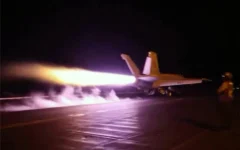 This screen grab made on July 22, 2026, from handout video footage released by the US Central Command on July 21, 2026 shows US forces launching what the military says are precision strikes targeting Iranian military capabilities for the eleventh consecutive night. (CENTCOM via AFP)