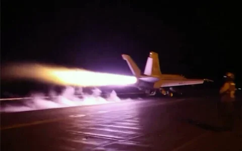 This screen grab made on July 22, 2026, from handout video footage released by the US Central Command on July 21, 2026 shows US forces launching what the military says are precision strikes targeting Iranian military capabilities for the eleventh consecutive night. (CENTCOM via AFP)