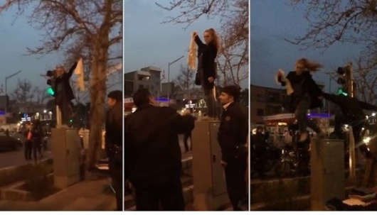 صحنه ای از بازداشت یکی از زنان معترض به حجاب اجباری در ایران صحنه ای از بازداشت یکی از زنان معترض به حجاب اجباری در ایران