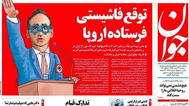 تصویر: کاریکاتوری در روزنامه اصولگرای جوان، «هایکو ماس»، وزیر خارجه آلمان را با عینک آبی به شکل ستاره داود، در حال سلام به شیوه نازیها ترسیم کرد. روزنامه ایرانی، ماس را به خاطر حمایت از اسرائیل در سخنان خود، محکوم نمود، ۱۱ ژوئن ۲۰۱۹. (Screenshot/Twitter) تصویر: کاریکاتوری در روزنامه اصولگرای جوان، «هایکو ماس»، وزیر خارجه آلمان را با عینک آبی به شکل ستاره داود، در حال سلام به شیوه نازیها ترسیم کرد. روزنامه ایرانی، ماس را به خاطر حمایت از اسرائیل در سخنان خود، محکوم نمود، ۱۱ ژوئن ۲۰۱۹. (Screenshot/Twitter)