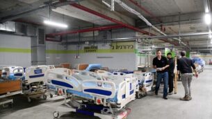workers preparing new wards following the spread of the Coronavirus at Tel Hashomer hospital on March 17, 2020. Photo by Flash90 *** Local Caption *** åéøåñ÷åøåðäîâôä
							<p class=