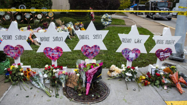TREE OF LIFE SYNAGOGUE, PITTSBURGH, PENNSYLVANIA, UNITED STATES - 2018/10/29: Flowers and stones are placed on the memorials erected outside of the Tree of Life Synagogue in Squirrel Hill. Members of Pittsburgh and the Squirrel Hill community pay their respects at the memorial to the 11 victims of the Tree of Life Synagogue massacre perpetrated by suspect Robert Bowers on Saturday, October 27. (Photo by Matthew Hatcher/SOPA Images/LightRocket via Getty Images) TREE OF LIFE SYNAGOGUE, PITTSBURGH, PENNSYLVANIA, UNITED STATES - 2018/10/29: Flowers and stones are placed on the memorials erected outside of the Tree of Life Synagogue in Squirrel Hill. Members of Pittsburgh and the Squirrel Hill community pay their respects at the memorial to the 11 victims of the Tree of Life Synagogue massacre perpetrated by suspect Robert Bowers on Saturday, October 27. (Photo by Matthew Hatcher/SOPA Images/LightRocket via Getty Images)