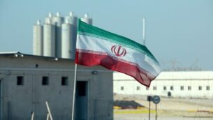 (FILES) In this file photo taken on November 10, 2019 an Iranian flag flutters in Iran's Bushehr nuclear power plant, during an official ceremony to kick-start works on a second reactor at the facility. - A magnitude 4.5 earthquake on Januray 8, 2020 rattled an area less than 50 kilometres (30 miles) from Iran's Bushehr nuclear power plant near the country's Gulf coast, a US monitor said. The quake, which had a depth of 10 kilometres, struck 17 kilometres south-southeast of Borazjan city at 6:49 am (0319 GMT), the US Geological Survey said on its website. State news agency IRNA said the earthquake was felt in Bushehr, site of the country's sole nuclear power plant. (Photo by ATTA KENARE / AFP)