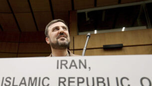 Iran's Ambassador to the International Atomic Energy Agency, IAEA, Gharib Abadi, waits for the start of the IAEA board of governors meeting at the International Center in Vienna, Austria, Thursday, Nov. 7, 2019. (AP Photo/Ronald Zak)