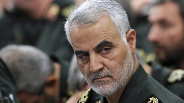 FILE- In this Sept. 18, 2016 photo released by an official website of the office of the Iranian supreme leader, Revolutionary Guard Gen. Qassem Soleimani, center, attends a meeting with Supreme Leader Ayatollah Ali Khamenei and Revolutionary Guard commanders in Tehran, Iran. A U.S. airstrike near Baghdad's airport on Friday Jan. 3, 2020 killed Gen. Qassem Soleimani, the head of Iran's elite Quds Force. Soleimani was considered the architect of Iran's policy in Syria. (Office of the Iranian Supreme Leader via AP, File)