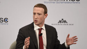 Facebook CEO Mark Zuckerberg speaks on the second day of the Munich Security Conference in Munich, Germany, Saturday, Feb. 15, 2020. (AP Photo/Jens Meyer)