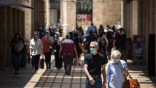 Jerusalemites wearing face masks for fear of coronavirus  walk and shop at the Mamilla mall near Jerusalem Old City on July 06, 2020. Israel has seen a spike of new COVID-19 cases bringing the authorities to reimpose restrictions to halt the spread of the virus.
Photo by Olivier Fitoussi/Flash90
  *** Local Caption *** ???????
?????? 
?????
????? ????
?????
?????