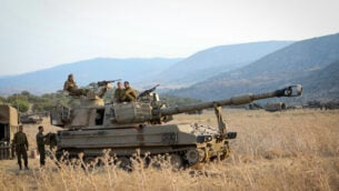 Israeli army forces seen stationed near the border between Israel and Lebanon in the Golan Heights on July 27, 2020. Photo by David Cohen/Flash90 *** Local Caption *** עשן
התקלות
כפר
לבנון
צה"ל
חייל
טנקים
כוחות
כבדים