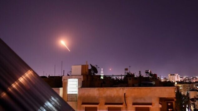 Syrian Air defences respond to Israeli missiles targeting south of the capital Damascus, on July 20, 2020. - Israeli strikes south of the Syrian capital wounded seven Syrian soldiers, state media reported, in an attack which a war monitor said hit several positions of regime forces and Iran-backed militias. (Photo by STR / AFP)