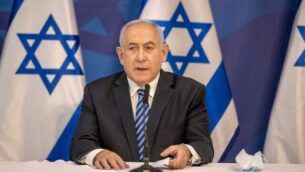 Israeli Prime Minister Benjamin Netanyahu issues a statement at the Israeli Defence Ministry in Tel Aviv on  July 27, 2020 following the high tensions with the Lebanese militant group Hezbollah at the Israeli-Lebanon border. (Photo by Tal SHAHAR / POOL / AFP)