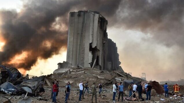 EDITORS NOTE: Graphic content / A picture shows a destroyed silo at the scene of an explosion at the port in the Lebanese capital Beirut on August 4, 2020. - Two huge explosion rocked the Lebanese capital Beirut, wounding dozens of people, shaking buildings and sending huge plumes of smoke billowing into the sky. Lebanese media carried images of people trapped under rubble, some bloodied, after the massive explosions, the cause of which was not immediately known. (Photo by STR / AFP)