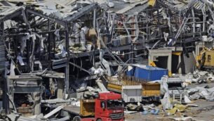 A picture shows the destruction at Beirut's port on August 10, 2020 following a huge chemical explosion that devastated large parts of the Lebanese capital and claimed over 150 lives. (Photo by JOSEPH EID / AFP)