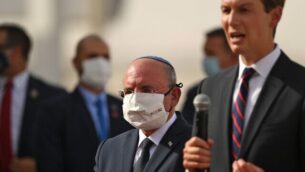 US Presidential Adviser Jared Kushner (R) speaks as he stands next to the Head of Israel's National Security Council Meir Ben-Shabbat (L) at the Abu Dhabi airport, in the first-ever commercial flight from Israel to the UAE, on August 31, 2020. - A US-Israeli delegation including White House advisor Jared Kushner took off on a historic first direct commercial flight from Tel Aviv to Abu Dhabi to mark the normalisation of ties between the Jewish state and the UAE. (Photo by NIR ELIAS / POOL / AFP)