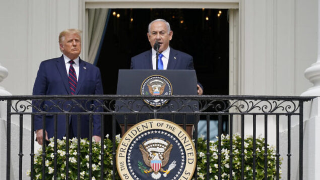 Israeli Prime Minister Benjamin Netanyahu speaks as President Donald Trump looks on, during the Abraham Accords signing ceremony on the South Lawn of the White House, Tuesday, Sept. 15, 2020, in Washington. (AP Photo/Alex Brandon) Israeli Prime Minister Benjamin Netanyahu speaks as President Donald Trump looks on, during the Abraham Accords signing ceremony on the South Lawn of the White House, Tuesday, Sept. 15, 2020, in Washington. (AP Photo/Alex Brandon)
