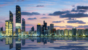View of Abu Dhabi Skyline at sunset, United Arab Emirates