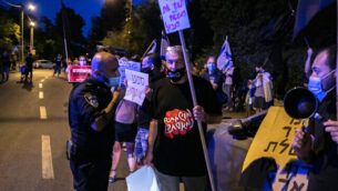Israelis protest against Israeli prime minister Benjamin Netanyahu, outside Israeli MK Nir Barkat's house at Beit HaKerem neighborhood in Jerusalem on October 3, 2020. Photo by Olivier Fitoussi/Flash90 *** Local Caption ***