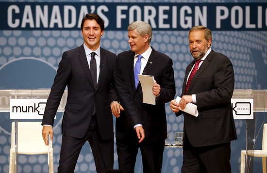 From left to right: Liberal leader Justin Trudeau), Conservative Prime Minister Stephen Harper,
and New Democratic Party leader Thomas Mulcair - reuters