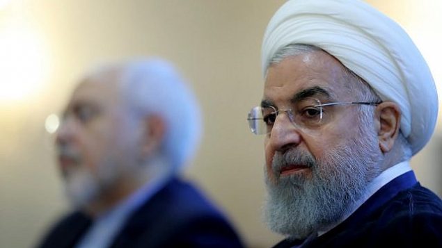 توضیح تصویر: در این عکس که در وبسایت رسمی ریاست جمهوری ایران منتشر شده، حسن روحانی رئیس جمهور حین حضور در ملاقاتی با گروهی از مقامات وزارت خارجه در تهران، دیده می شود. ایران، 22 ژوئیه 2018.