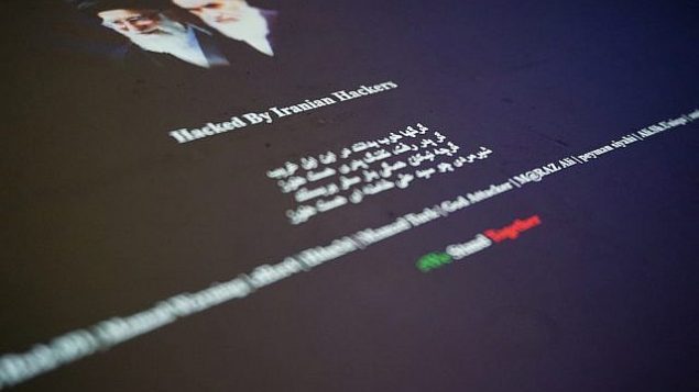تصویر: صفحه اصلی یک وبسایت عربستان سعودی که با شعارهای فارسی به مضمون «هکرهای ایرانی هک کردند» تخریب شده و عکس آن در لندن، پنجشنبه ۸ ژوئن ۲۰۱۷ گرفته شده است. همچنان که تنش ها میان عربستان سعودی، قطر، و ایران و متحدان ایشان بالا می گیرد، گزارش هایی از هک در سراسر خلیج پدیدار می شود.
(AP Photo/Raphael Satter) تصویر: صفحه اصلی یک وبسایت عربستان سعودی که با شعارهای فارسی به مضمون «هکرهای ایرانی هک کردند» تخریب شده و عکس آن در لندن، پنجشنبه ۸ ژوئن ۲۰۱۷ گرفته شده است. همچنان که تنش ها میان عربستان سعودی، قطر، و ایران و متحدان ایشان بالا می گیرد، گزارش هایی از هک در سراسر خلیج پدیدار می شود.
(AP Photo/Raphael Satter)